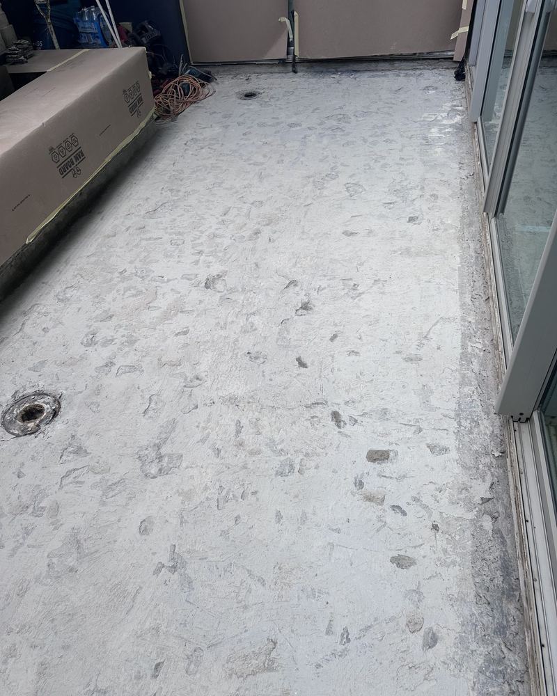 Balcony stripped back to the concrete slab