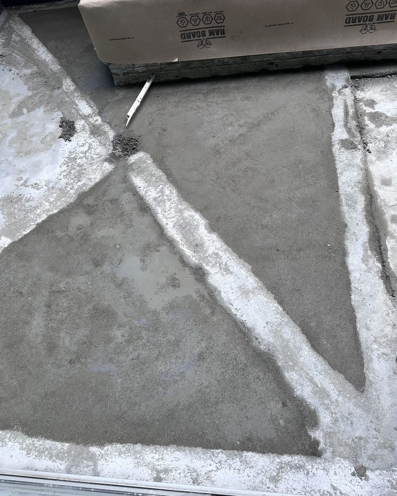 New screed laid to correct the falls on a balcony
